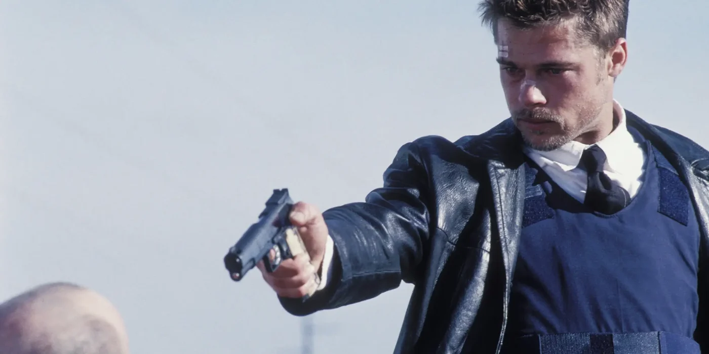 Brad Pitt as Mills aiming a gun at Kevin Spacey in Se7en