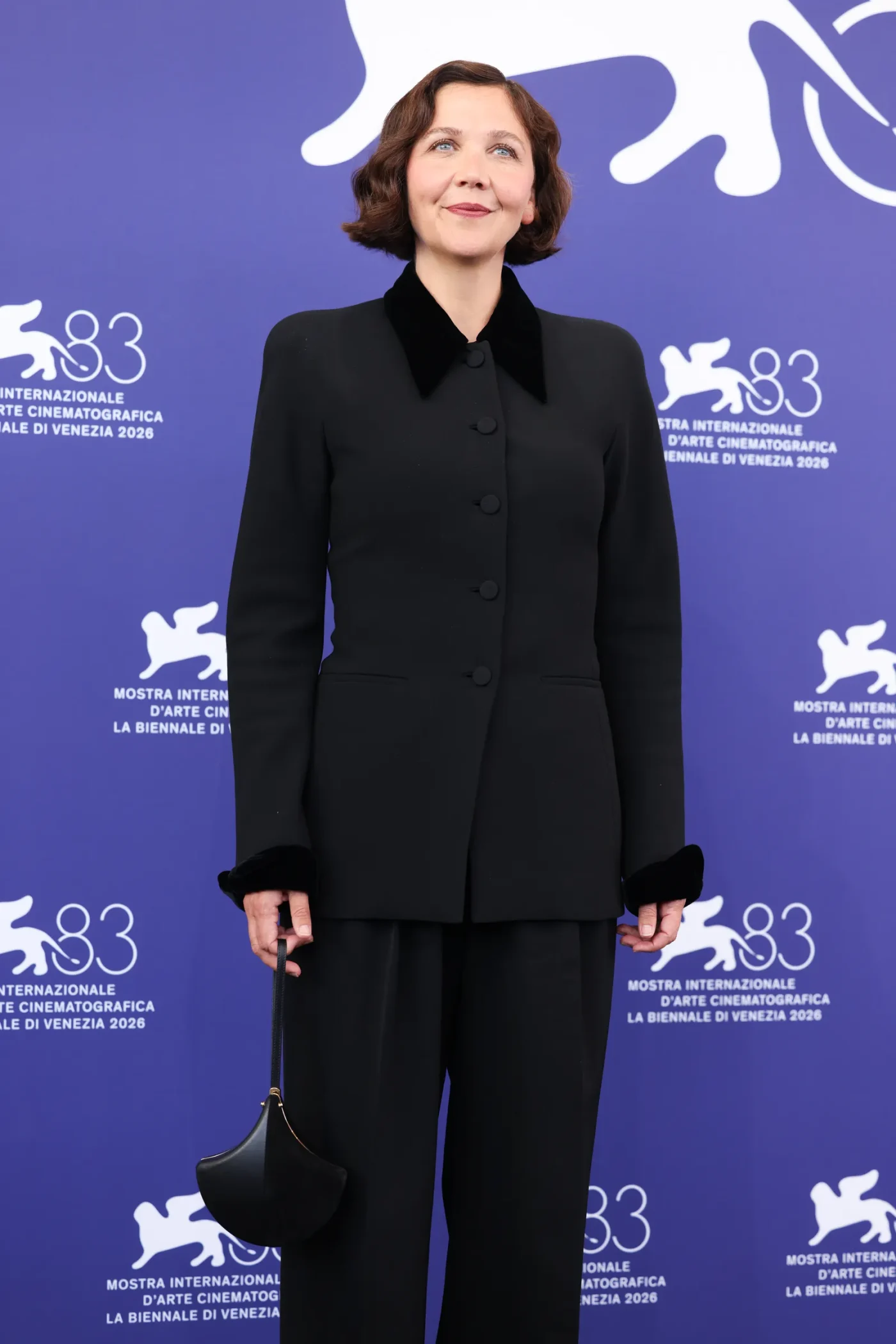 VENICE ITALY SEPTEMBER 02 Jury president Maggie Gyllenhaal attends the Jury Photocall during the 83rd Venice...
