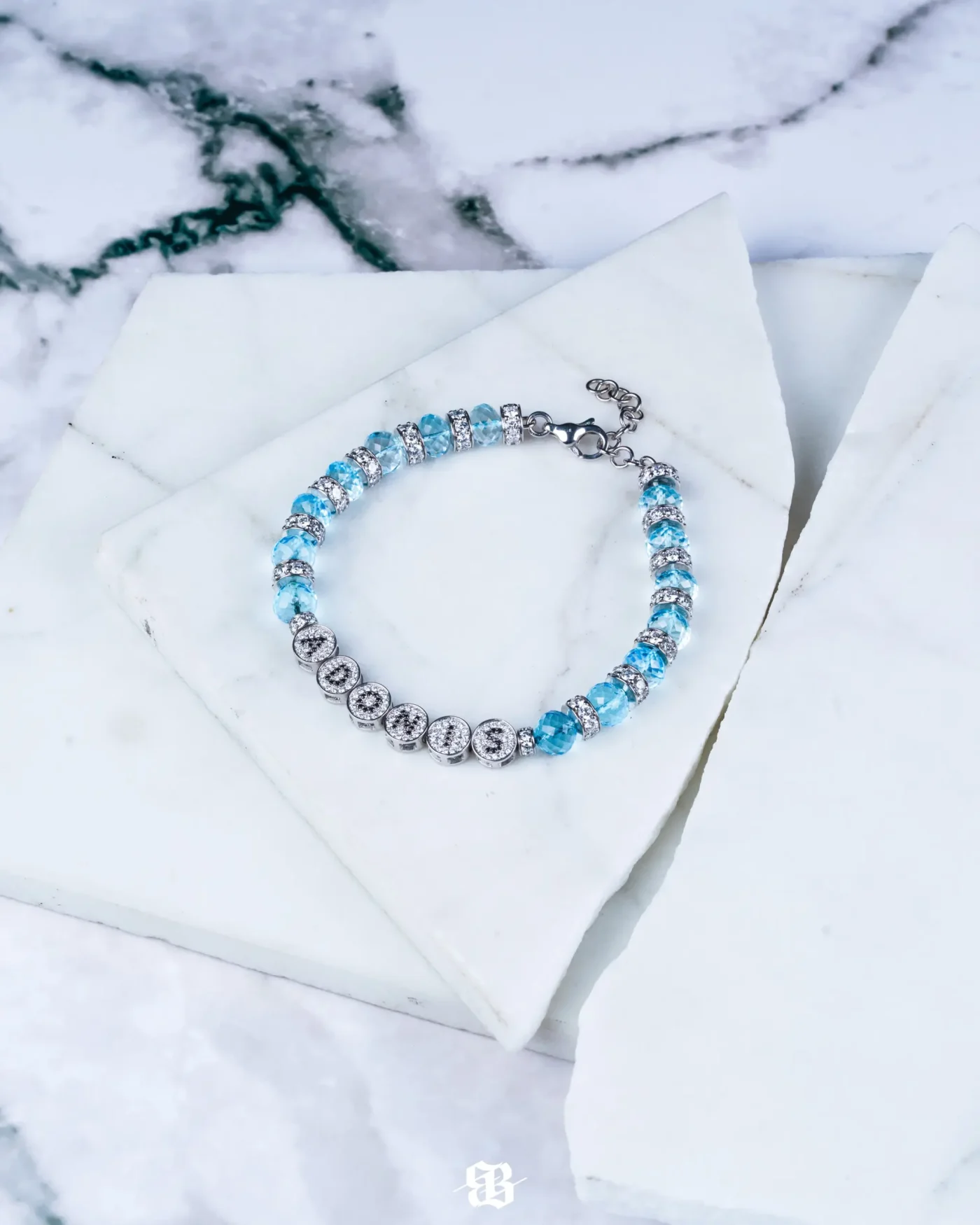 A diamond and blue gemstone bracelet dedicated to Drake