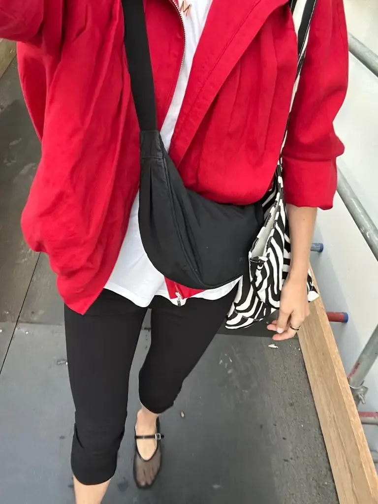 A red jacket with a bold printed tote bag was a winning formula to put a spring into my step on a rainy London day