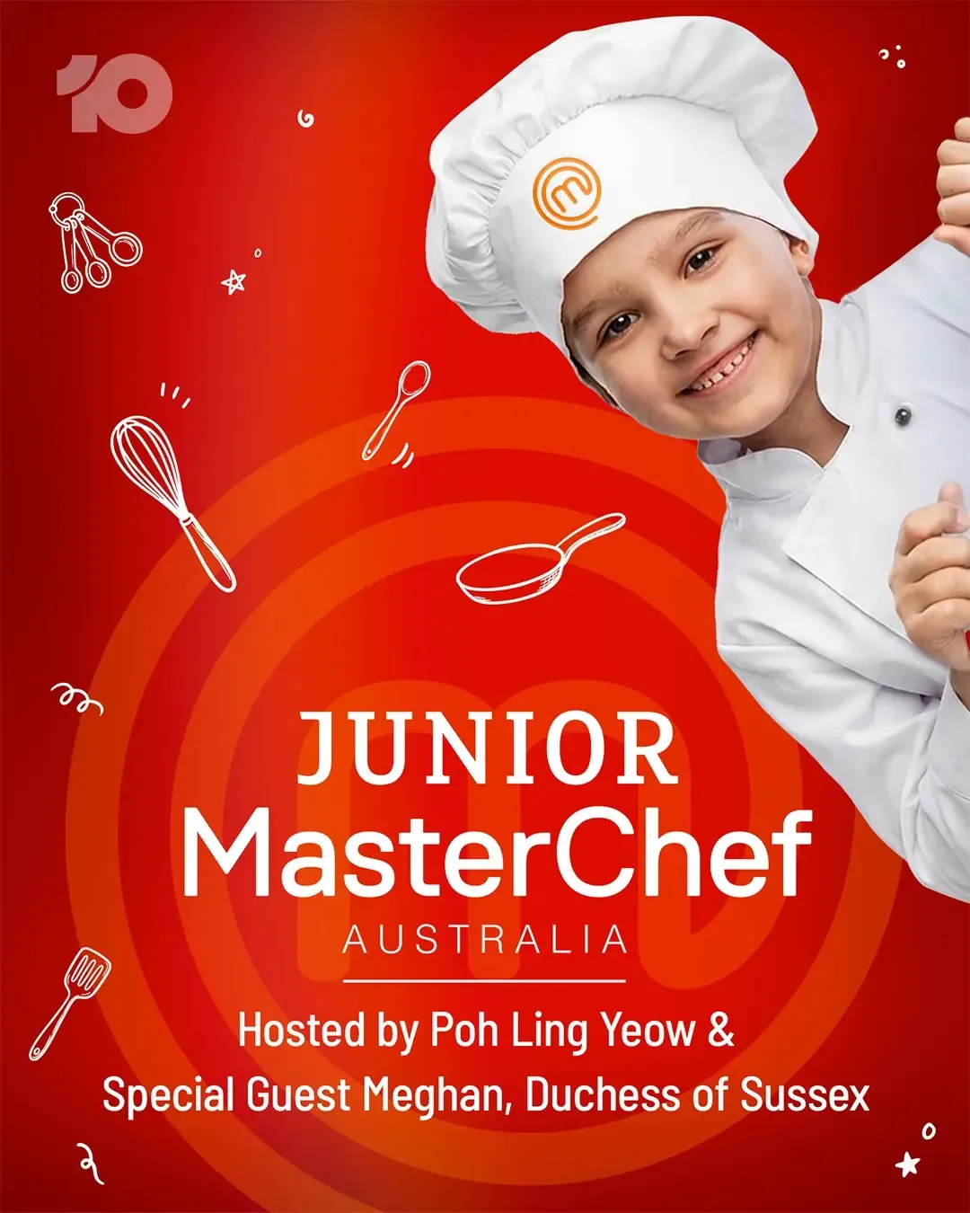 A smiling child wearing a chef