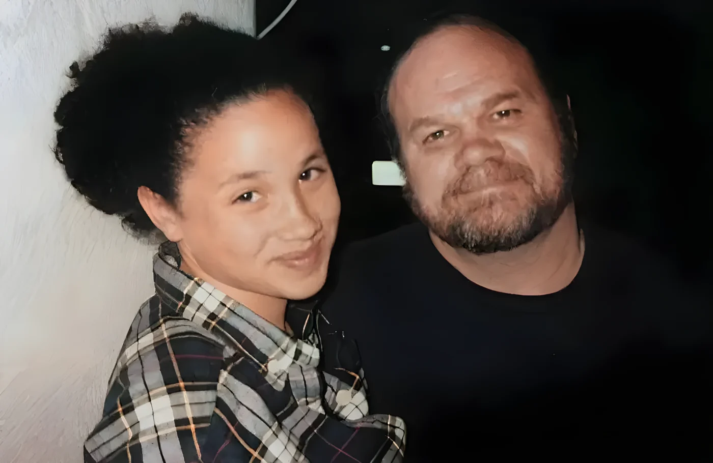 A teenage Meghan Markle with dad Thomas Markle