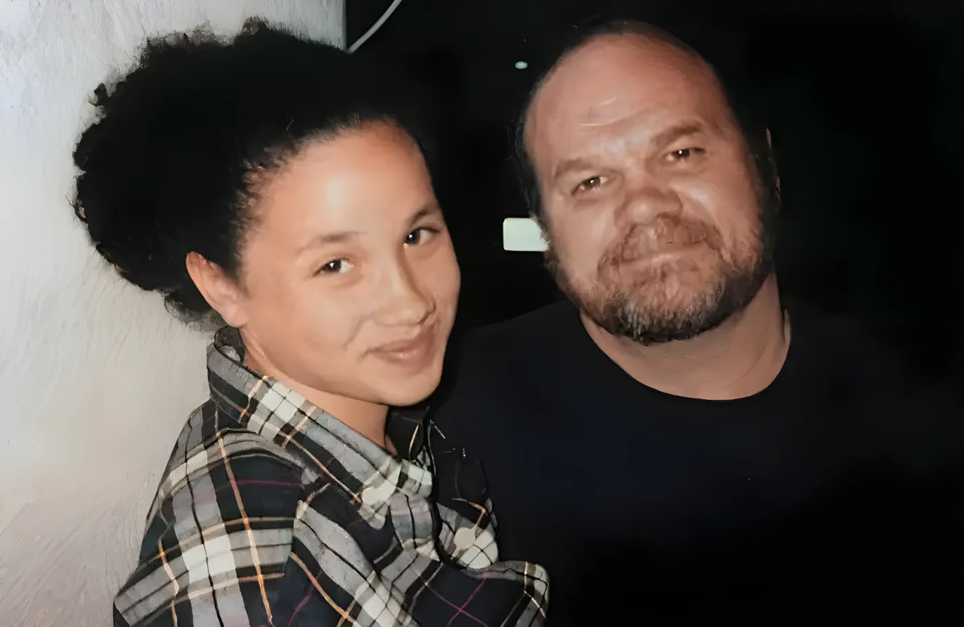 A teenage Meghan Markle with dad Thomas Markle