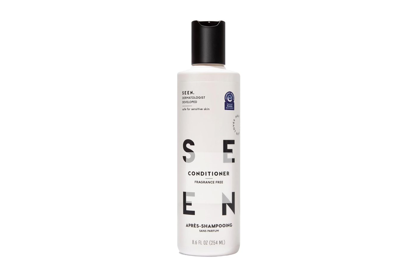 A white bottle of SEEN fragrance-free conditioner with a black cap.