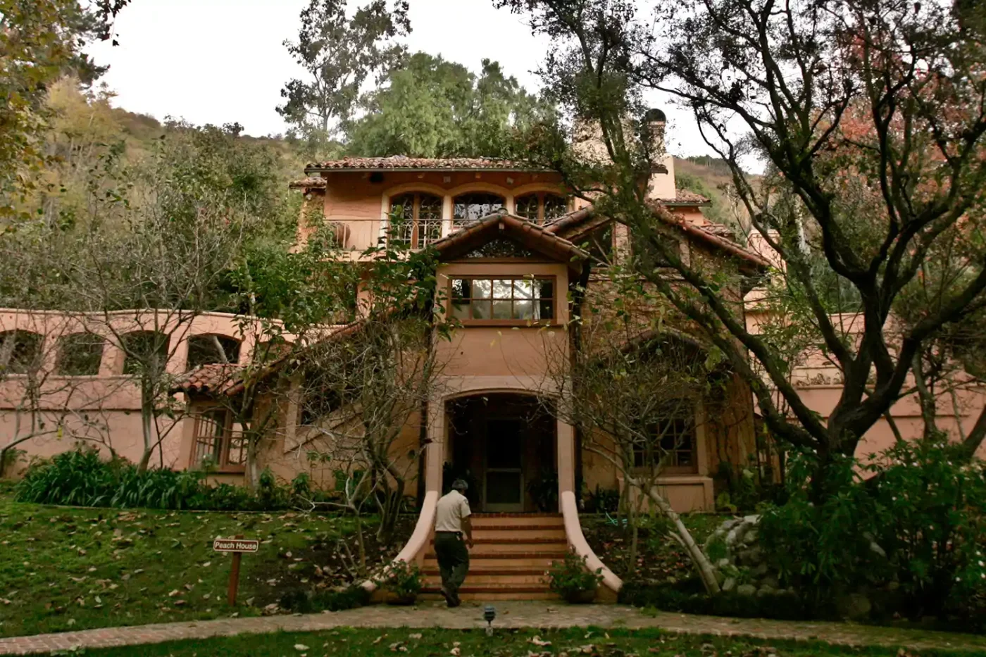 A worker enters a Santa Monica Mountains Conservancy building inside Ramirez Canyon Park Tuesday, Dec. 12, 2006, in Malibu, Calif.