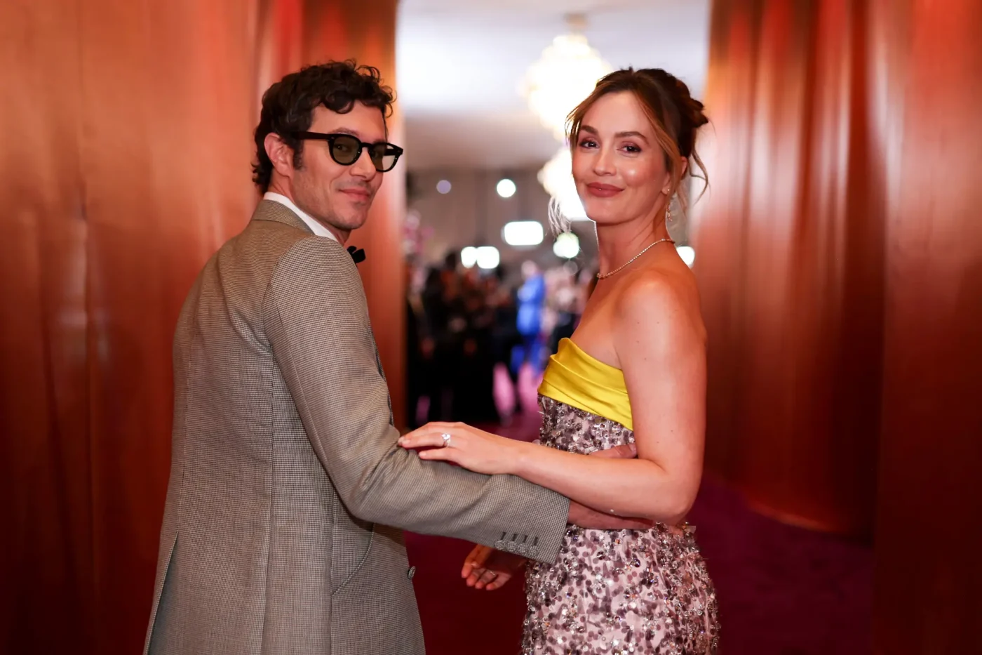Adam Brody and Leighton Meester on the red carpet at the Golden Globes.