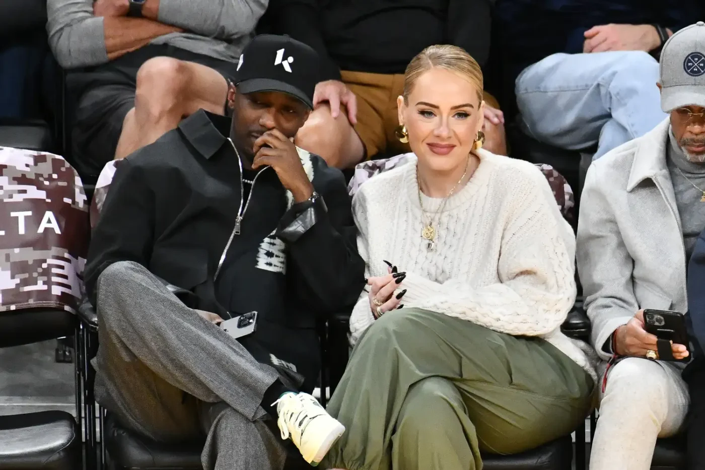 Adele and Rich Paul seated together at an event