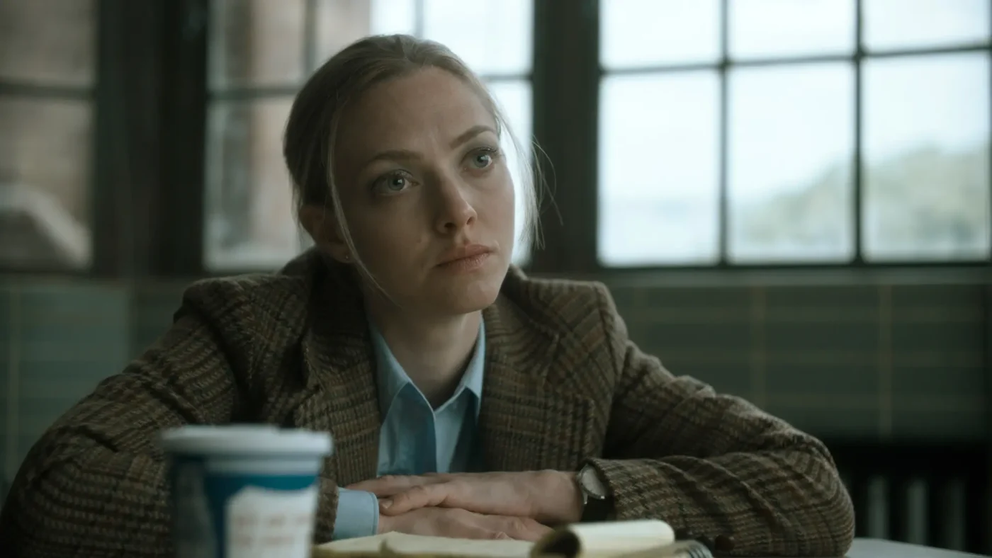 Amanda Seyfried wearing a tweed jacket in a scene from
