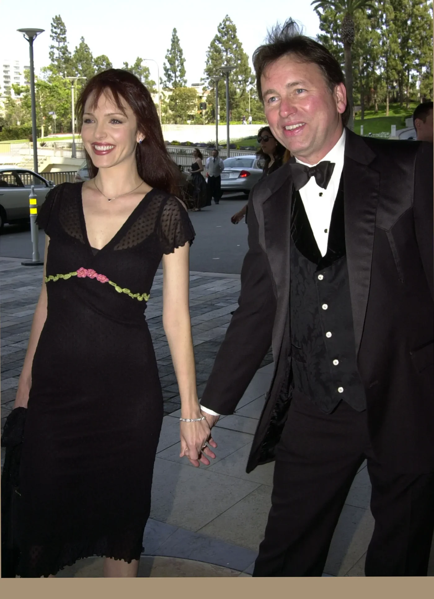 Amy Yasbeck and John Ritter.