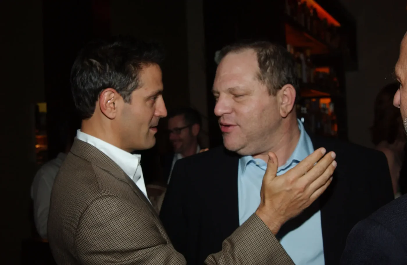 Ari Emanuel and Harvey Weinstein talking at an event.