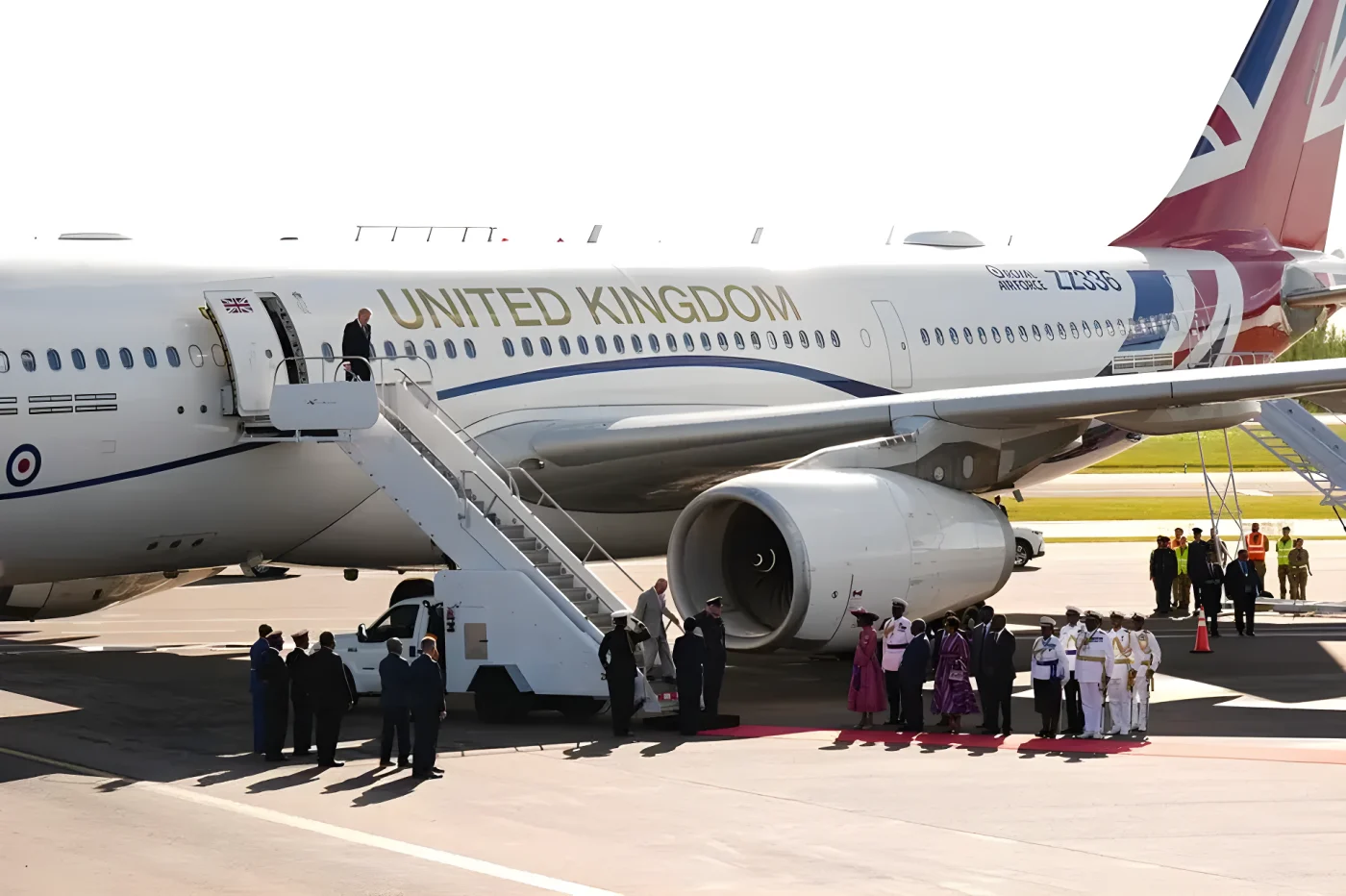 Britain's King Charles III disembarks from his plane at Lynden Pindling International Airport in Nassau, Bahamas