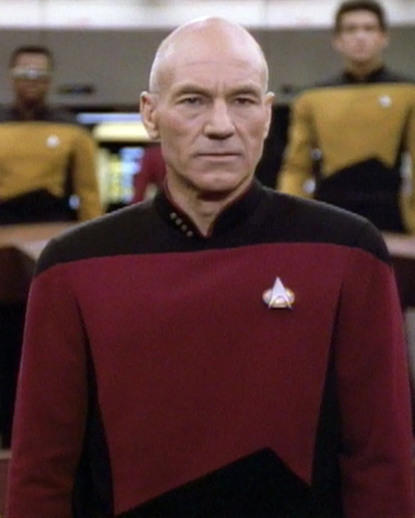British actor Patrick Stewart (as Captain Jean-Luc Picard) in a scene from an episode of the television series