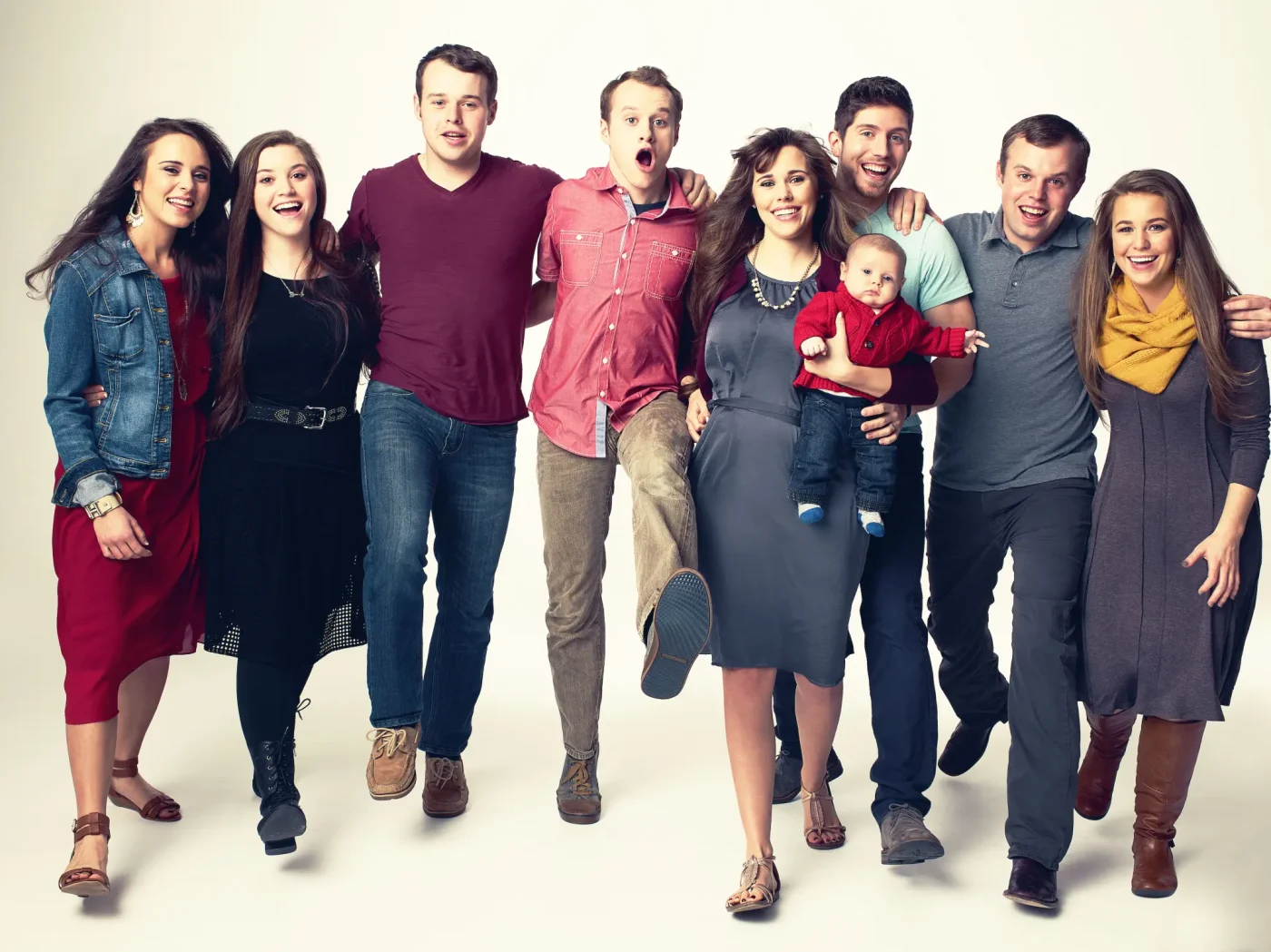Cast of Jill & Jessa: Counting On posing together, including Jinger, Joy Anna, Joseph, Josiah, Jessa holding Spurgeon, Ben, John David, and Jana.