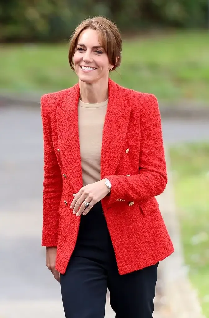 Catherine in red blazer with hair up