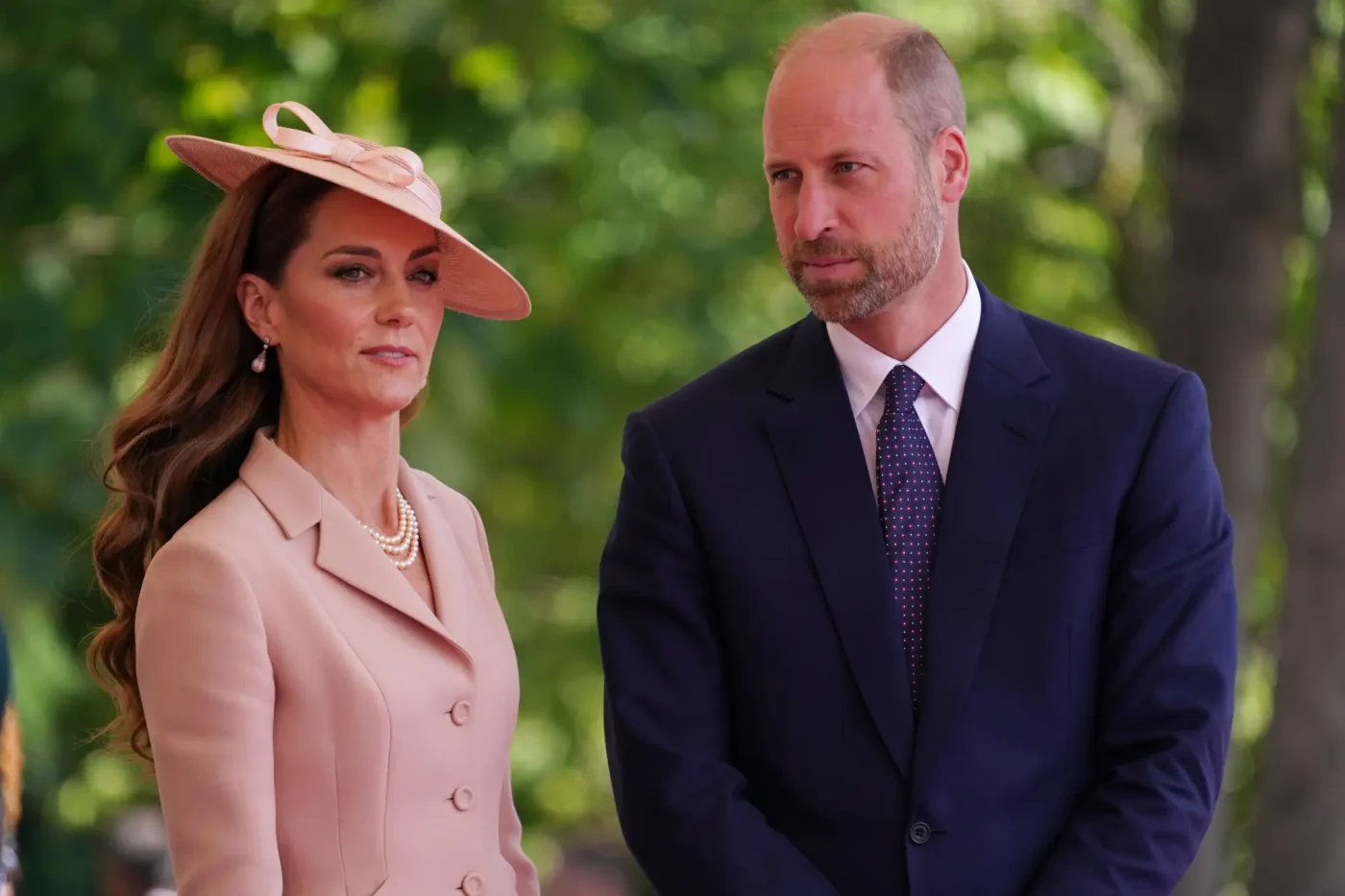 Catherine, Princess of Wales and Prince William, Prince of Wales stand at Windsor Castle.