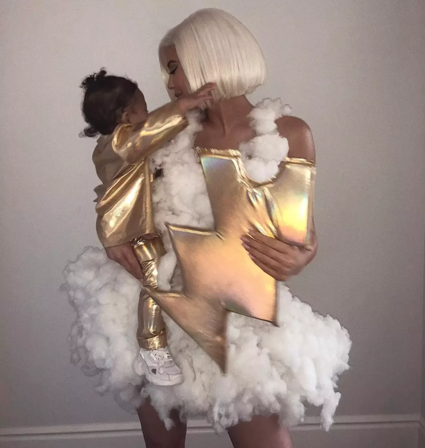 Celeb family Halloween costumes 2018 Kylie Jenner and Stormi Webster in Thunder and Lightening Costumes