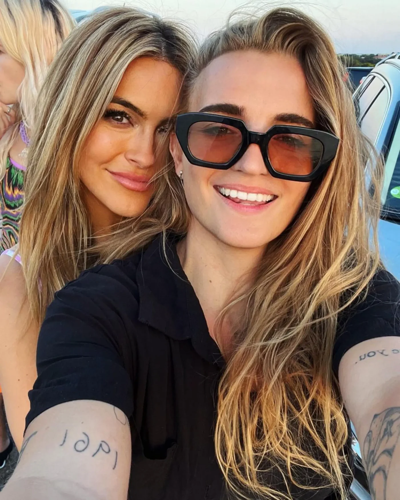 Chrishell Stause and G Flip pose together for a selfie.