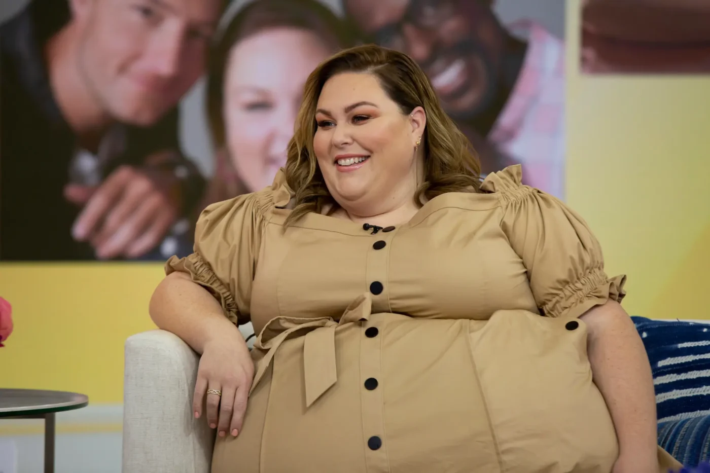 Chrissy Metz sitting on a talk show set.