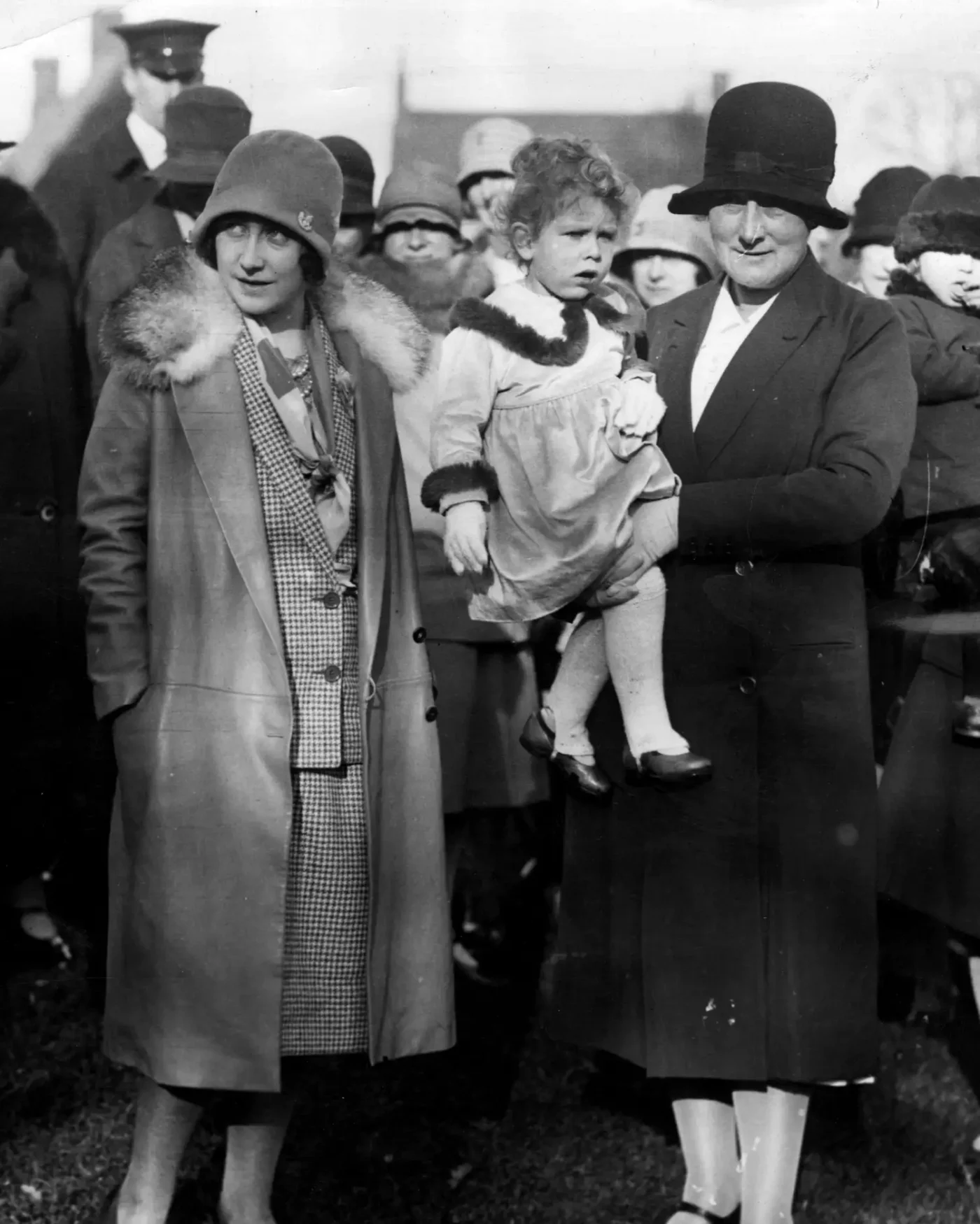 Circa 1927: Elizabeth, Duchess of York (1900 - 2002) (left) with Princess Elizabeth and Mrs Clara Cooper Knight in a Leicestershire hunting field.