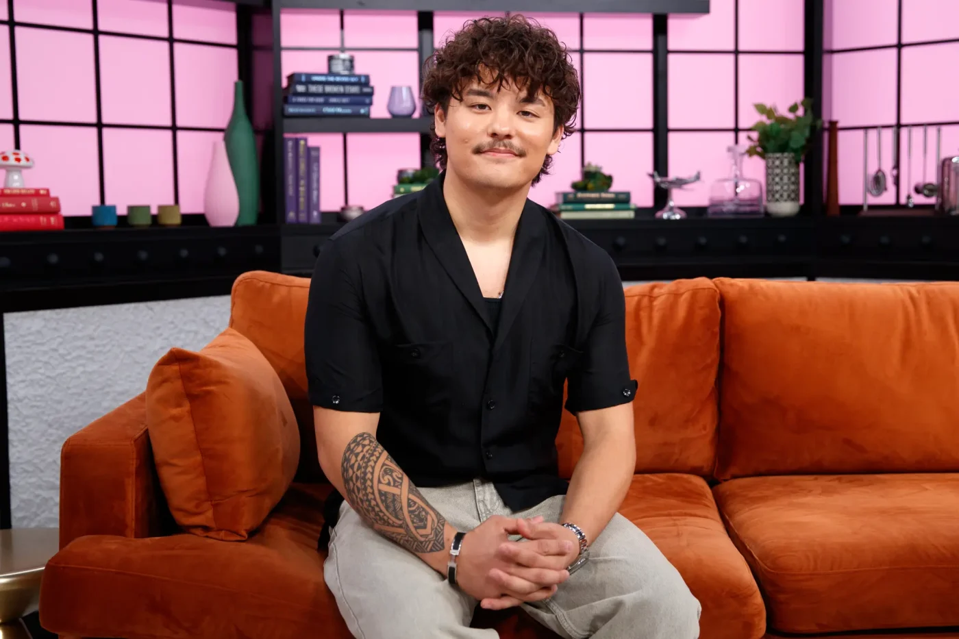 Collin Gosselin sitting on an orange couch during a Page Six Virtual Reali-Tea interview.