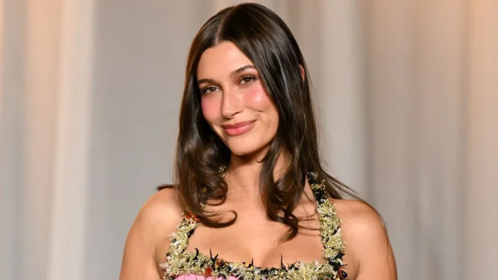 Hailey Bieber Takes the Pantsless Trend to a New Level in Sheer Glitter Tights and an Off-the-Shoulder Top