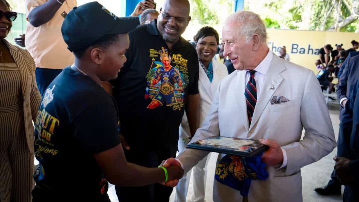 King Charles Surprised by Muscular Boxing T-Shirt of Himself During Caribbean Tour Stop in The Bahamas