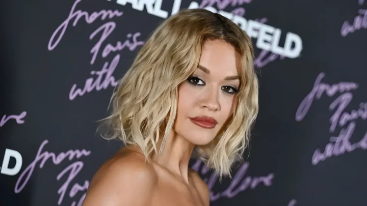 Rita Ora Reinvents Dolly Parton’s Iconic Style With an Unbuttoned Shirt and Push-Up Bra: Inside Her Realistic Fitness Transformation