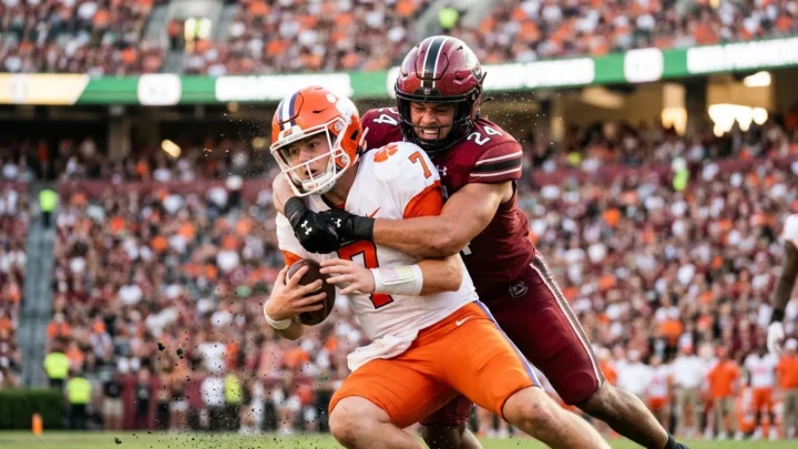 Tennessee Volunteers quarterback George MacIntyre prepares a pass during a college football matchup