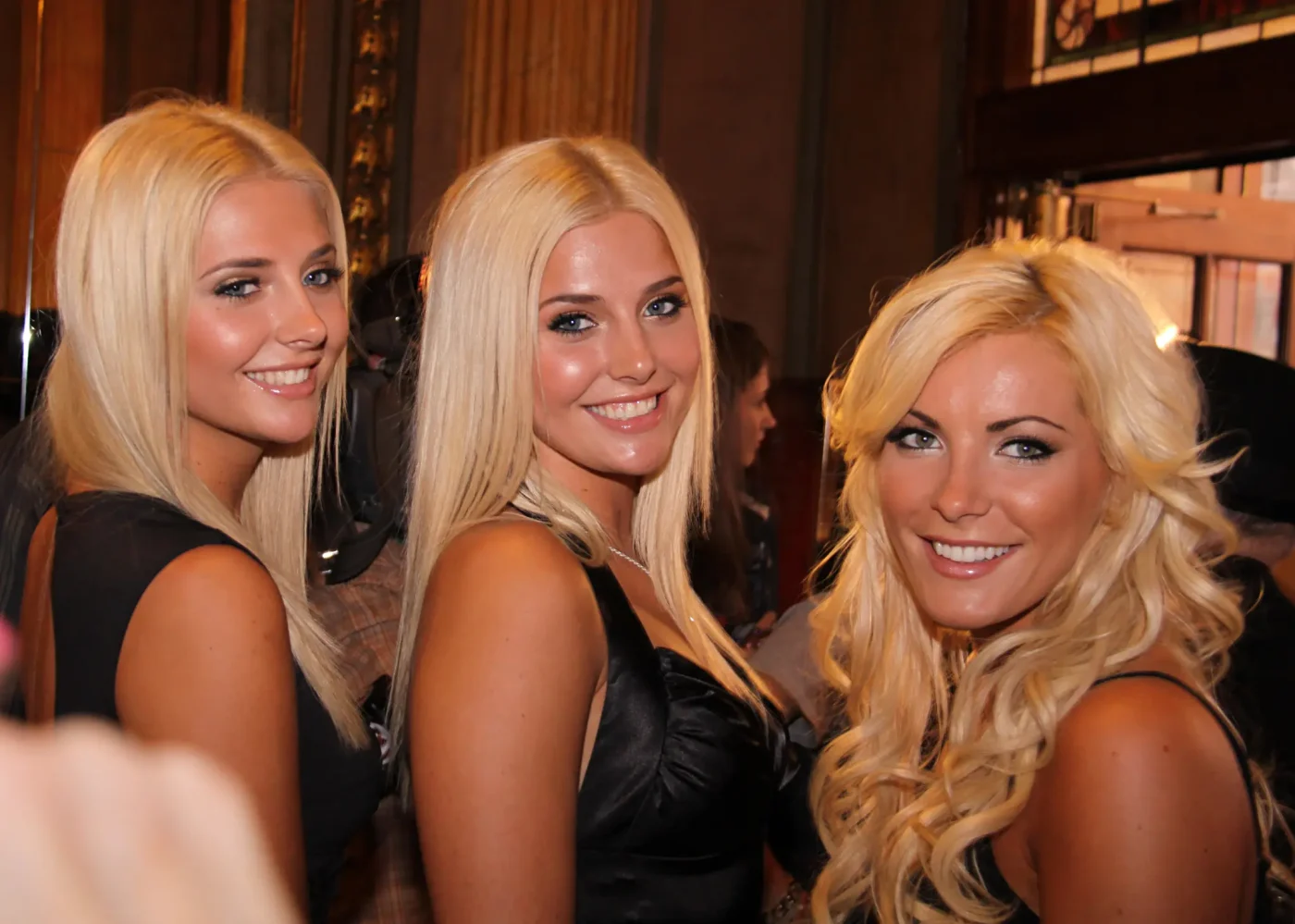 Crystal Harris, Karissa Shannon, and Kristina Shannon posing together at a premiere.