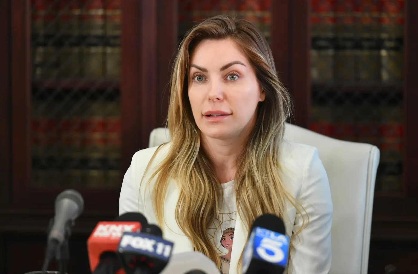 Crystal Hefner speaks at a press conference.