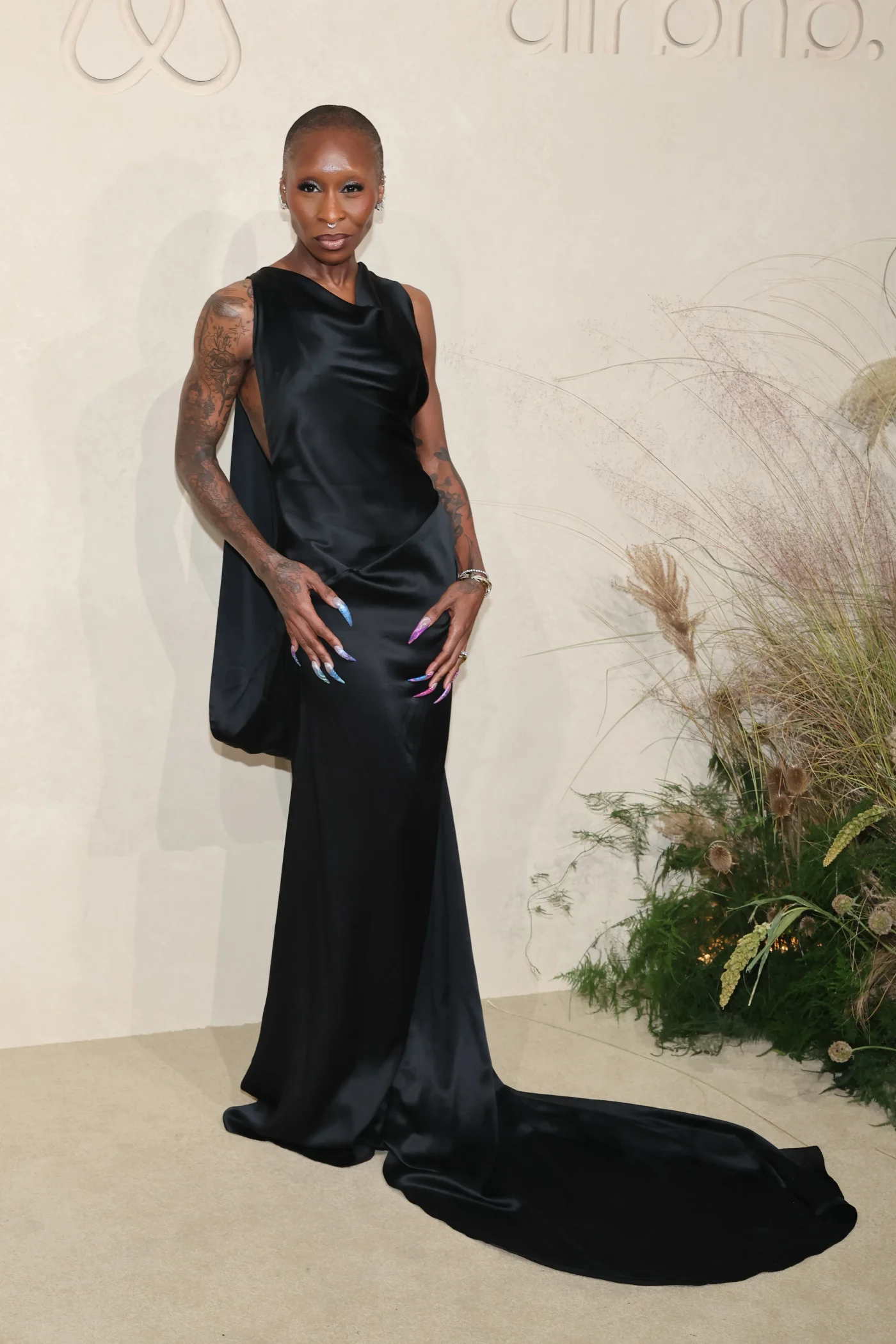 Cynthia Erivo in a black dress at Airbnb.org