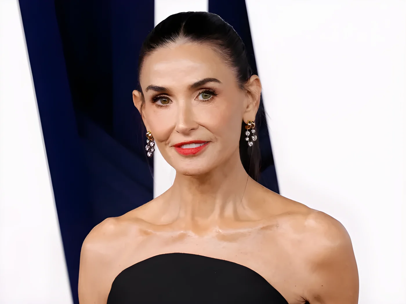 Demi Moore posing at an event
