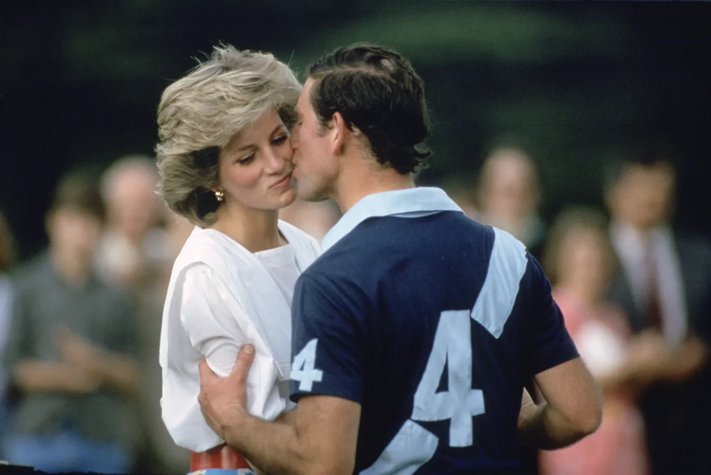 Diana Princess of Wales interacting with another person at a public event