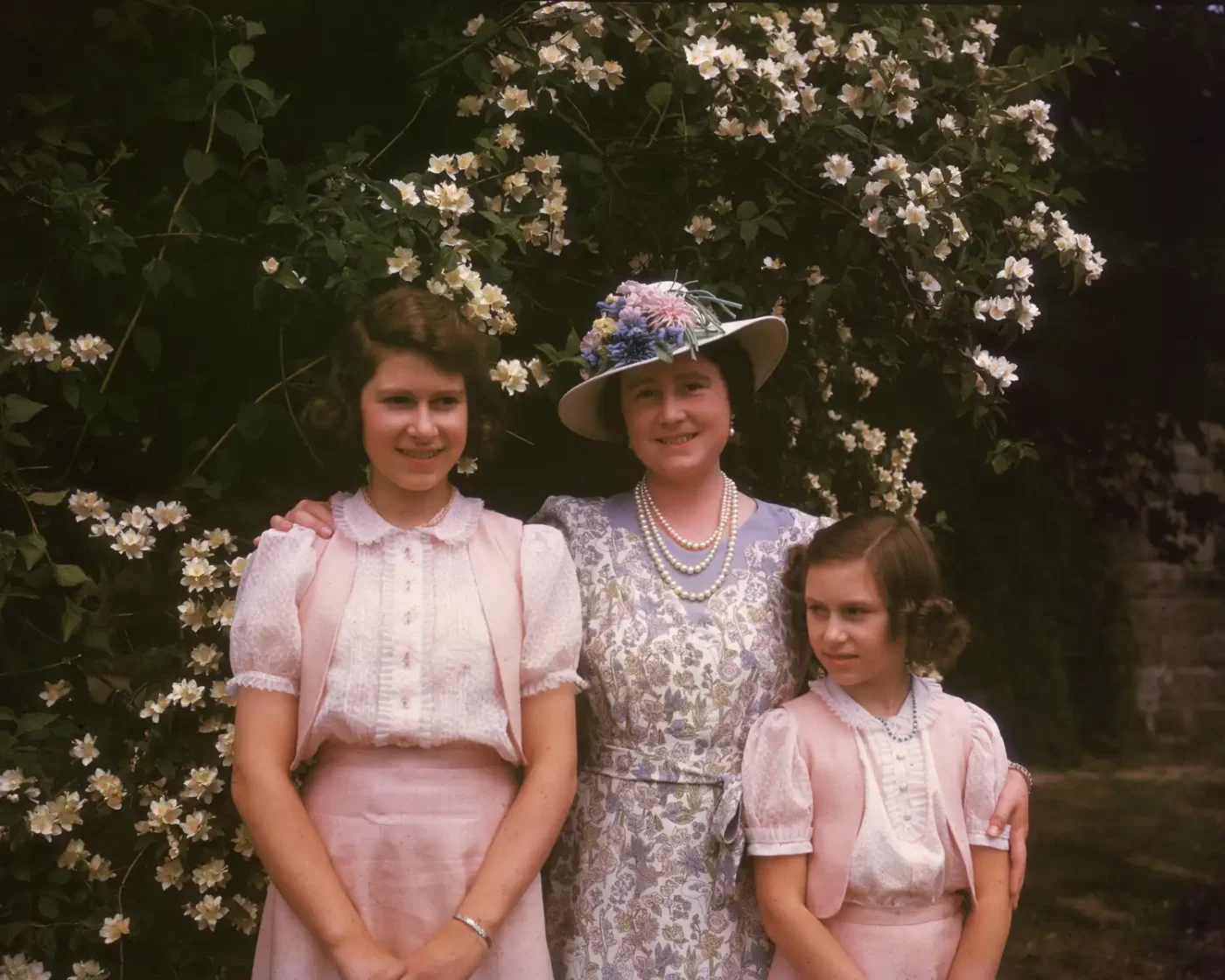 Elizabeth the Queen Mother with daughters Princess Elizabeth and Princess Margaret at Windsor Castle, July 8, 1941.