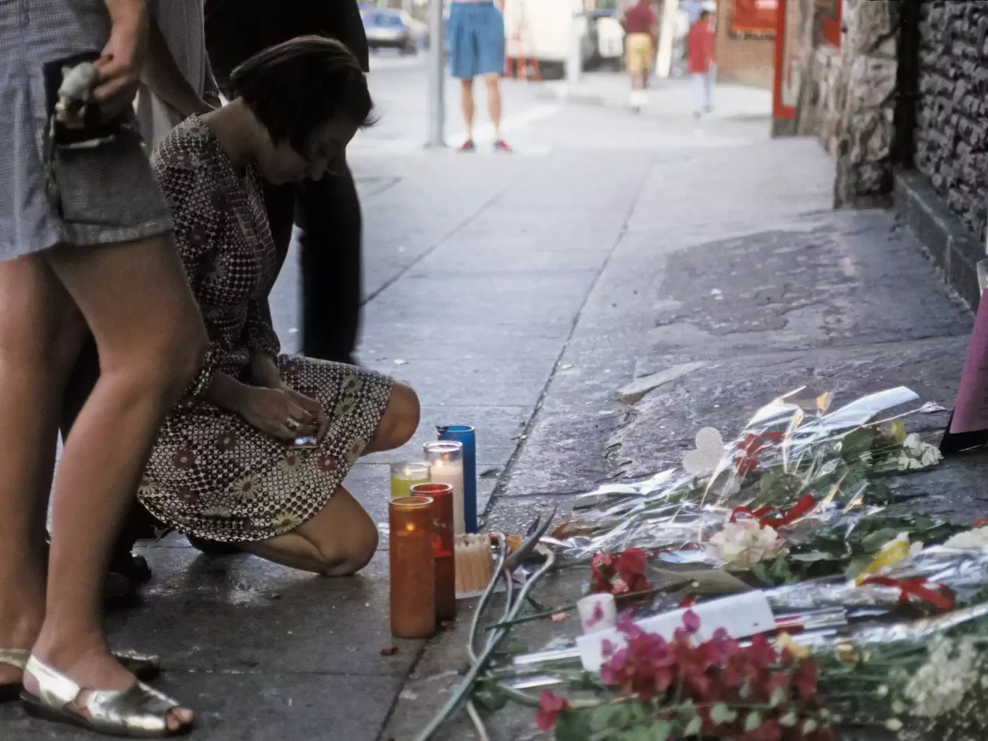Fans are placing flowers, candles and notes at the spot where River Phoenix died