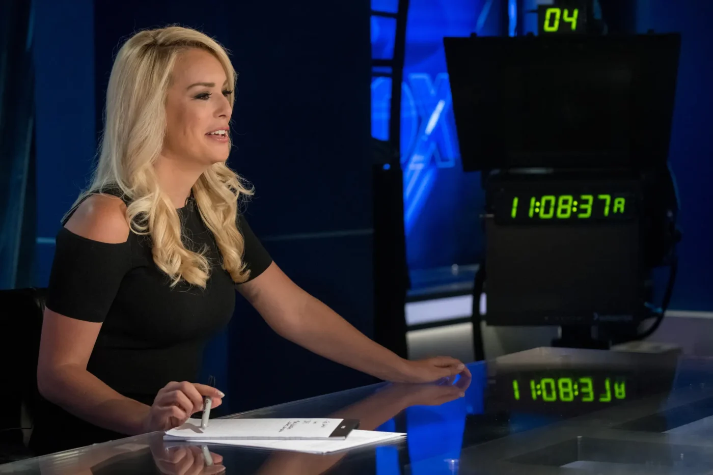 Former ESPN reporter Britt McHenry visits the Fox news set.