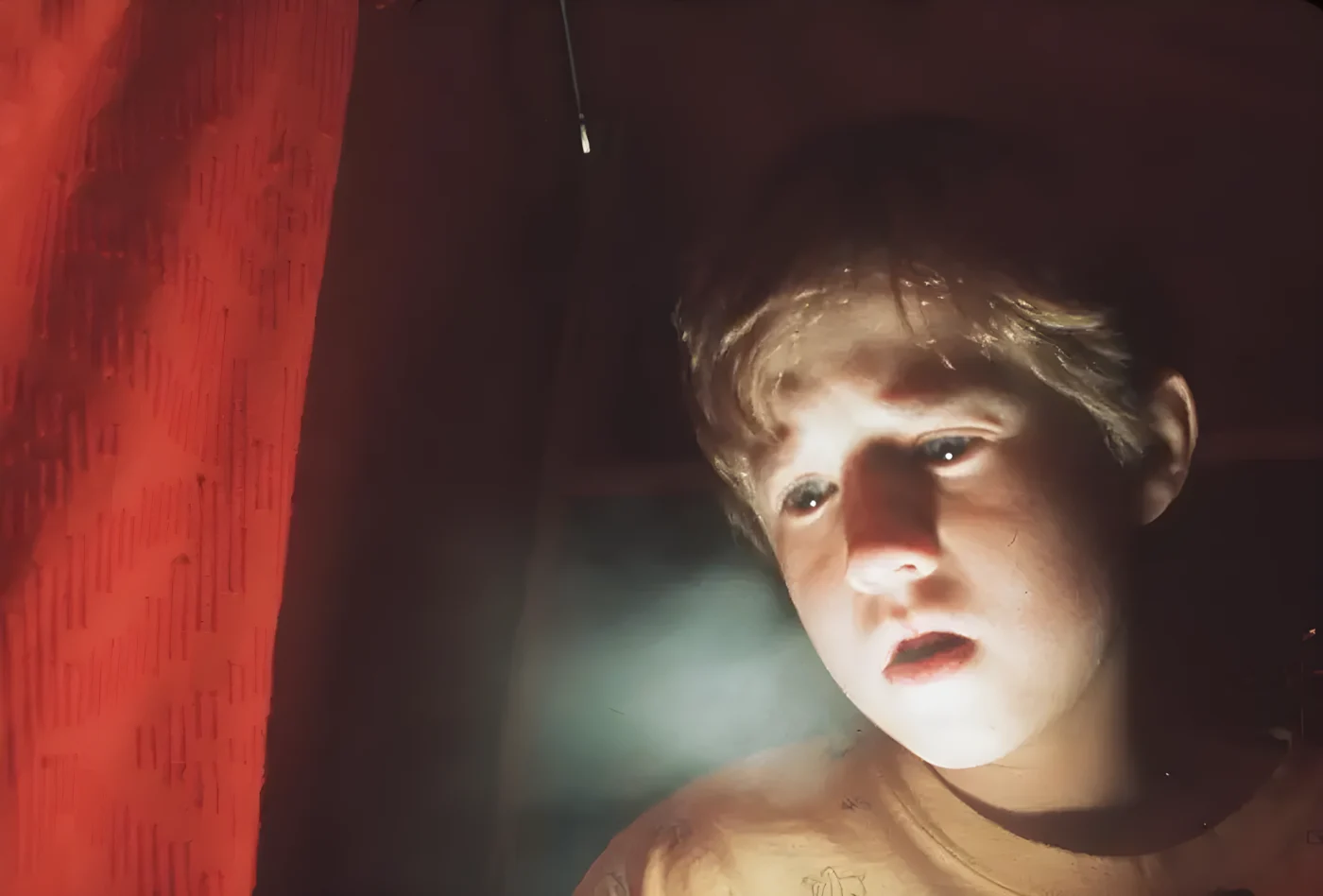 Frightened By His Paranormal Powers, 8-Year-Old Cole Sear (Haley Joel Osment) Is Too Young To Understand His Purpose In "The Sixth Sense."