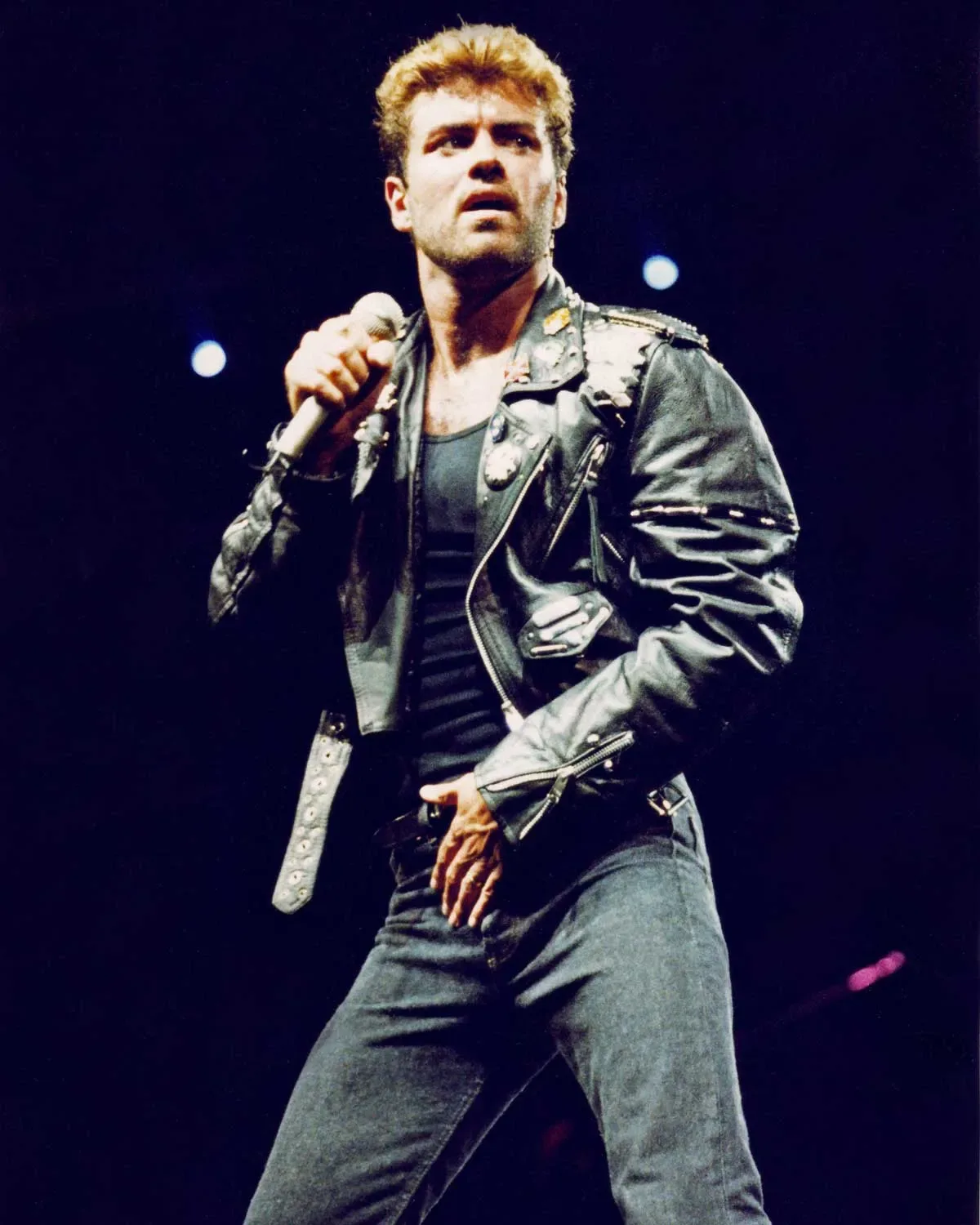 George Michael performs on stage on his