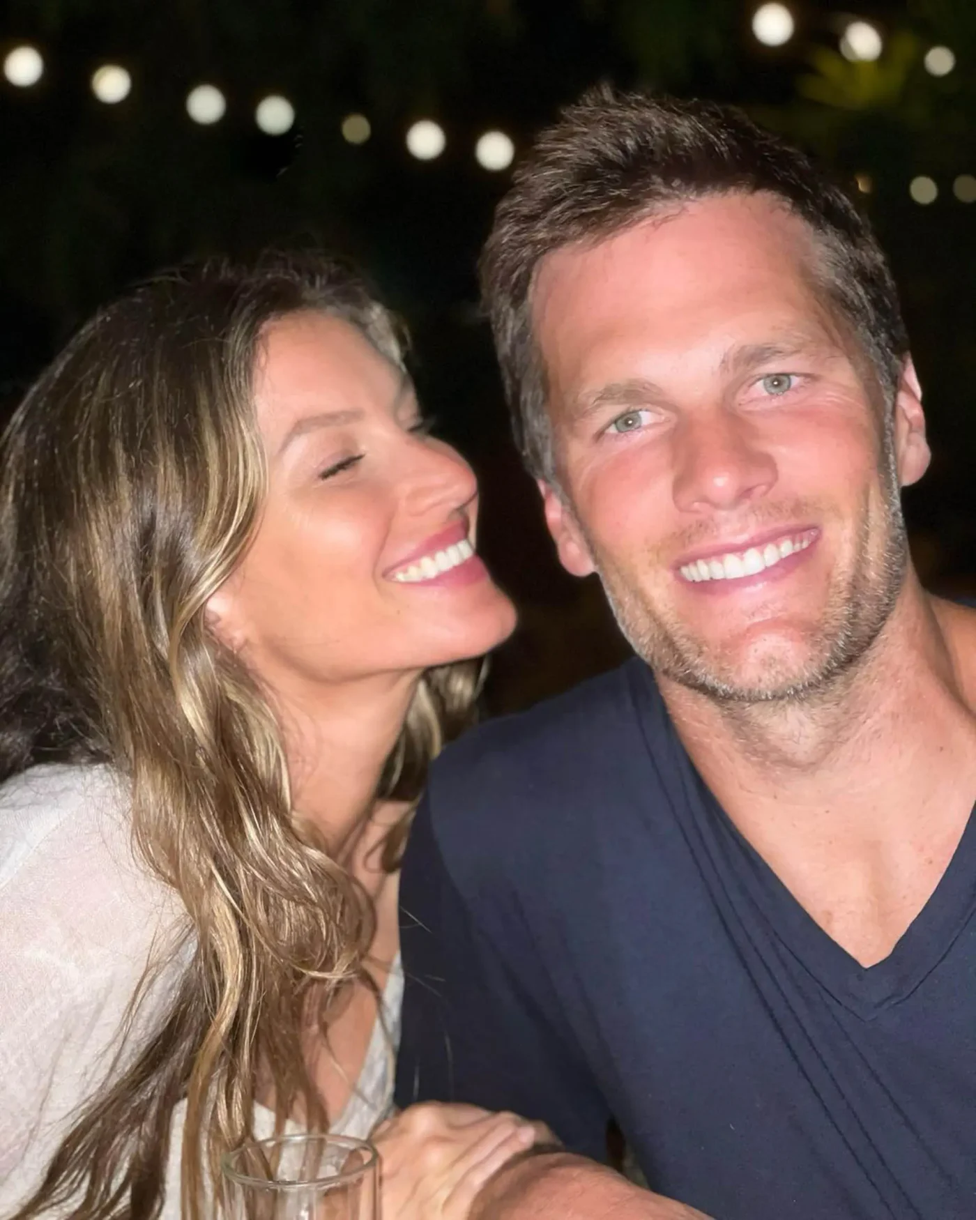 Gisele Bündchen and Tom Brady smiling together.