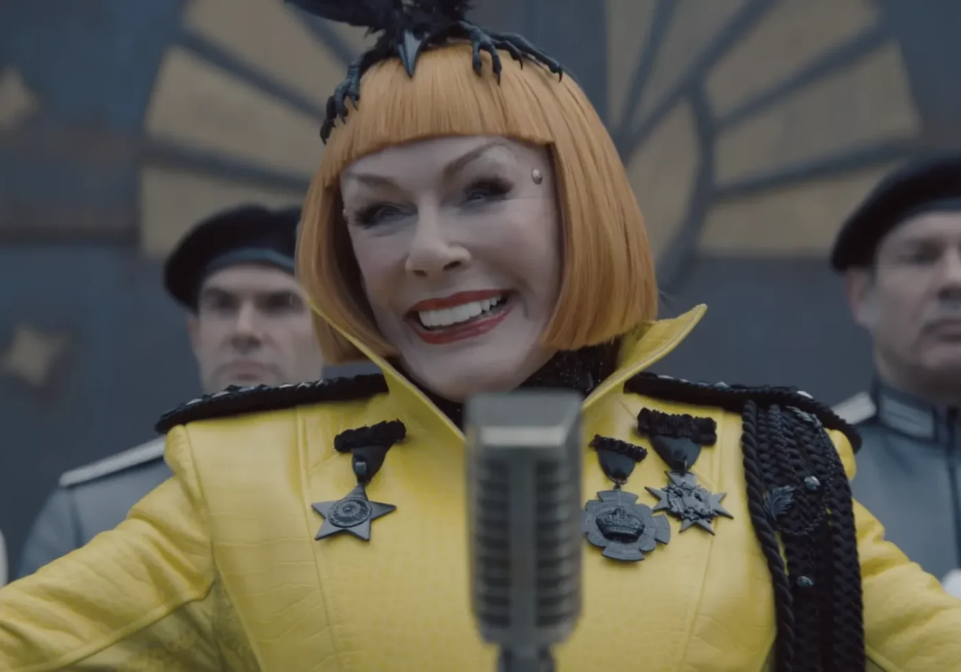Glenn Close smiles in character as Drusilla Sickle from