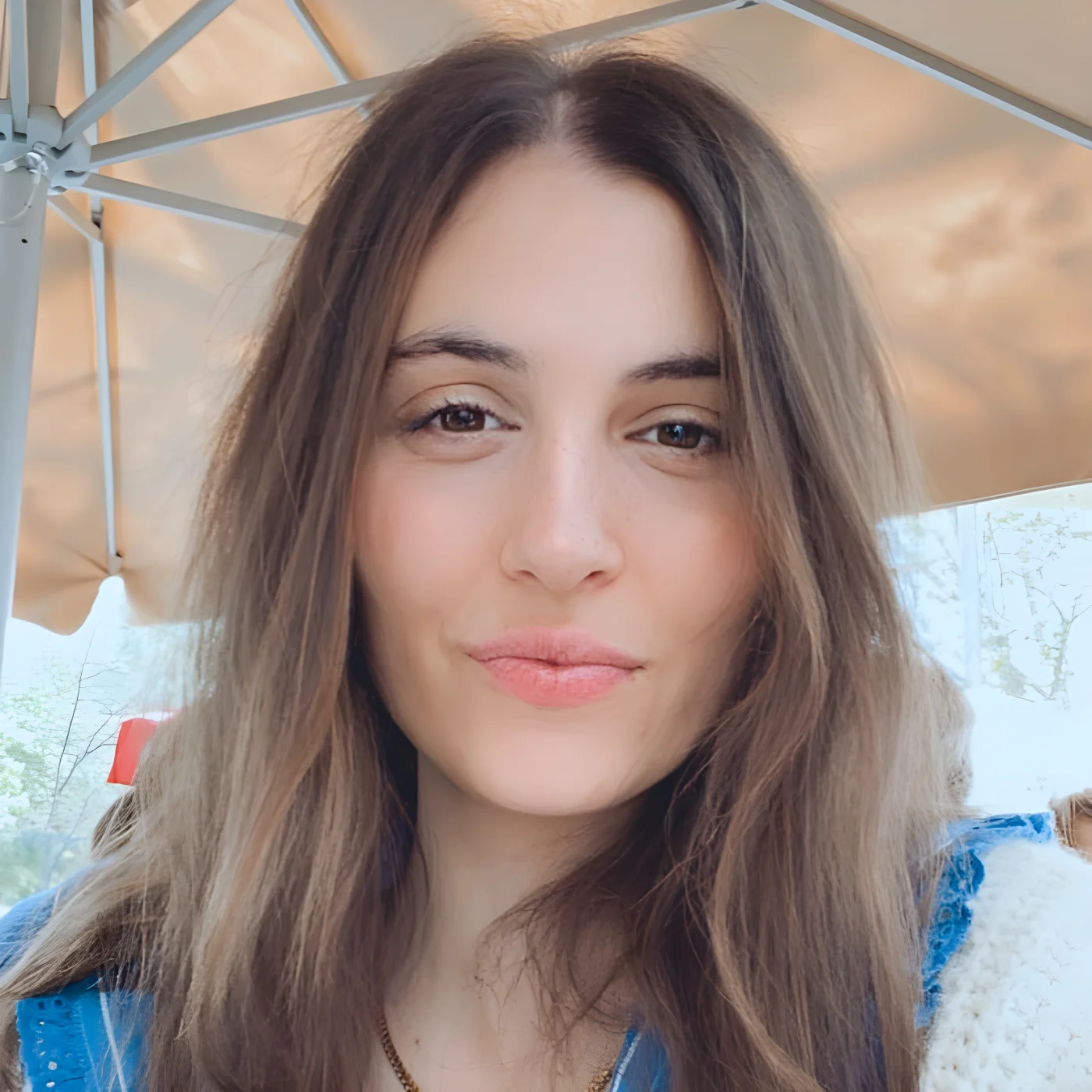 Headshot of María Muñiz