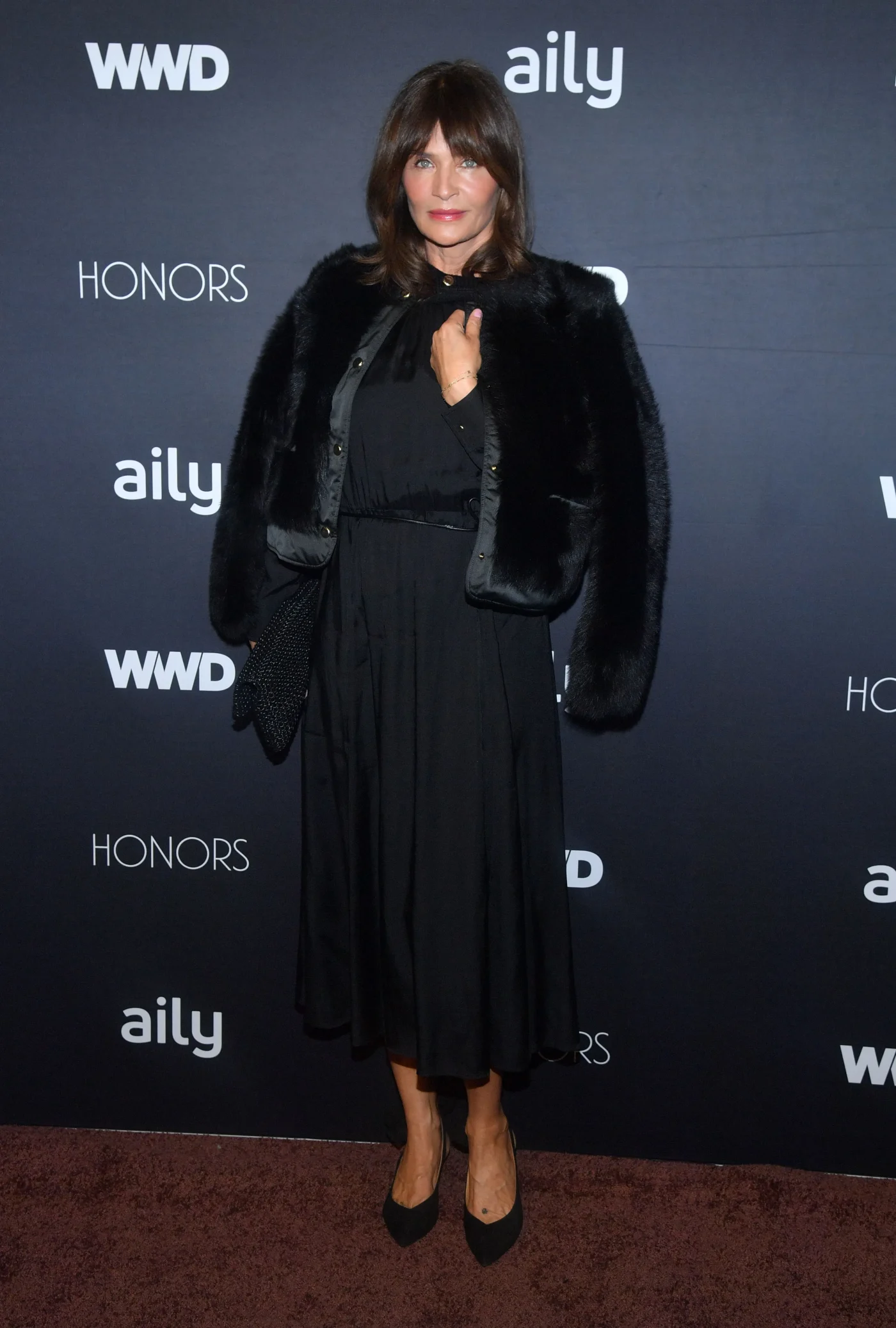Helena Christensen poses at the WWD Honors in New York.