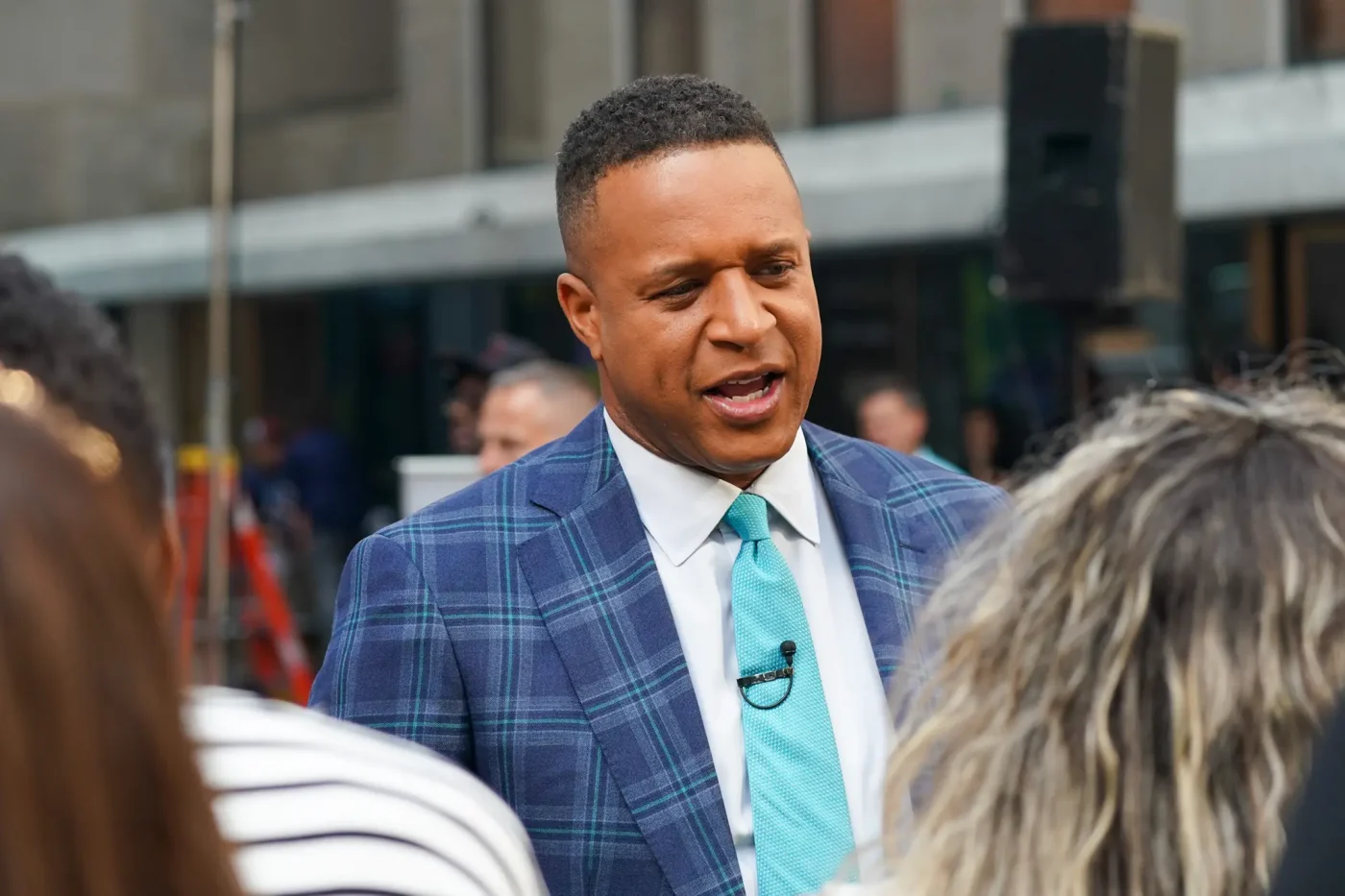 Host Craig Melvin greets fans in the Rockefeller Plaza.