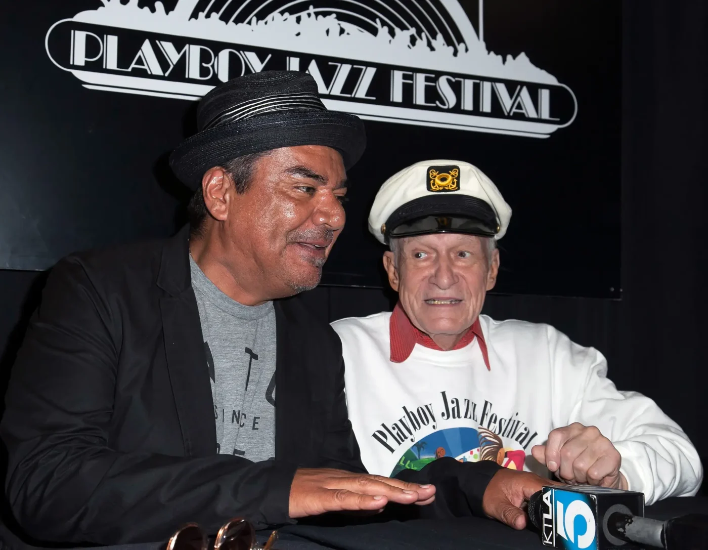 Host George Lopez and publisher Hugh Hefner at a press conference for the Playboy Jazz Festival.