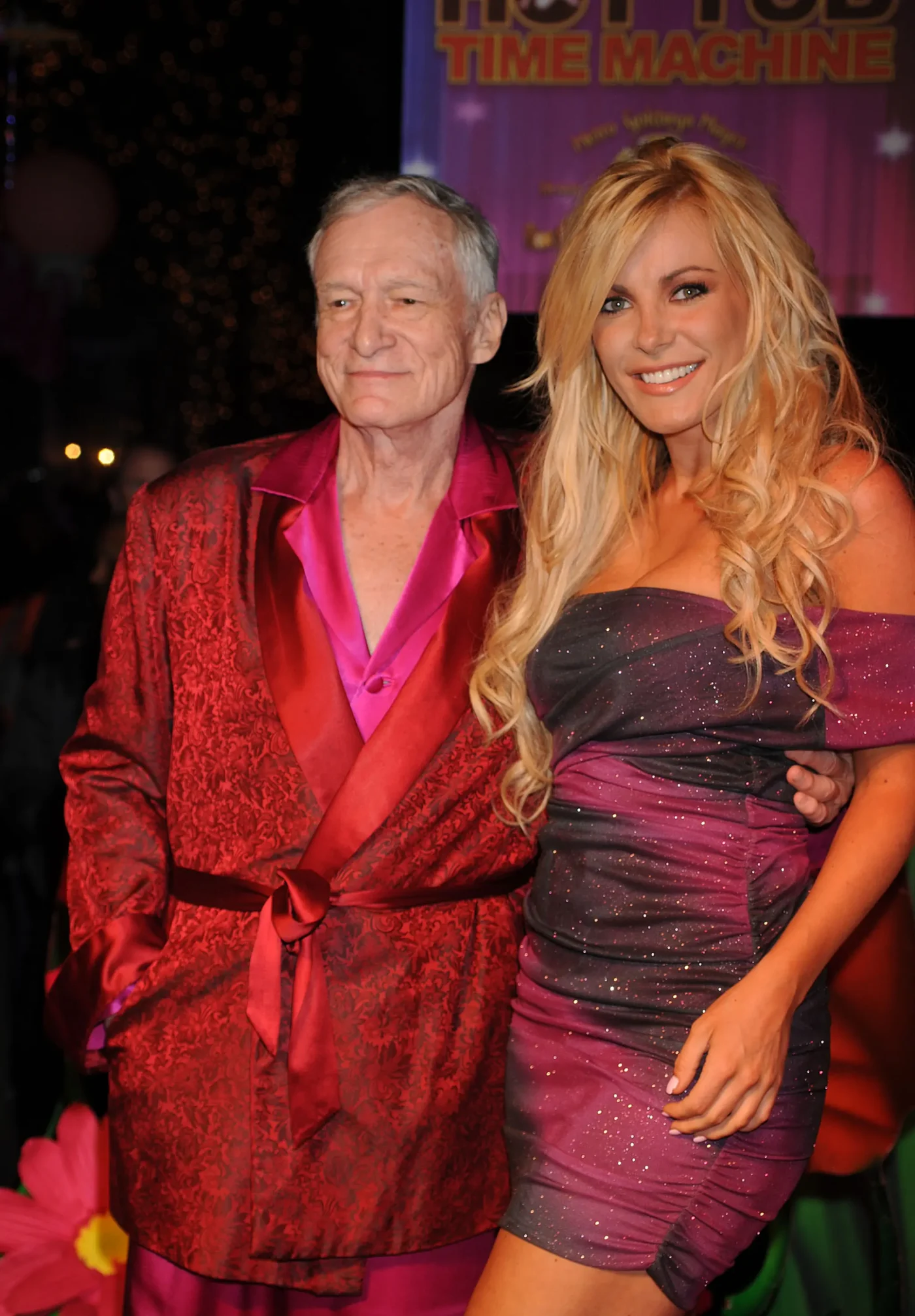 Hugh Hefner and Crystal Harris at an event.