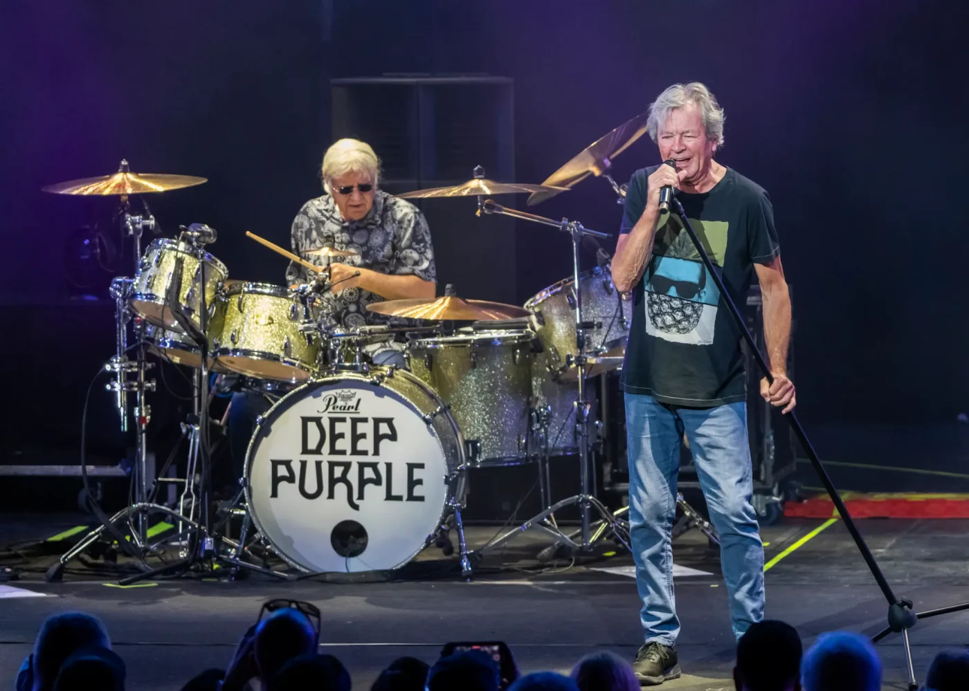 Ian Paice and Ian Gillan of Deep Purple performing on stage.