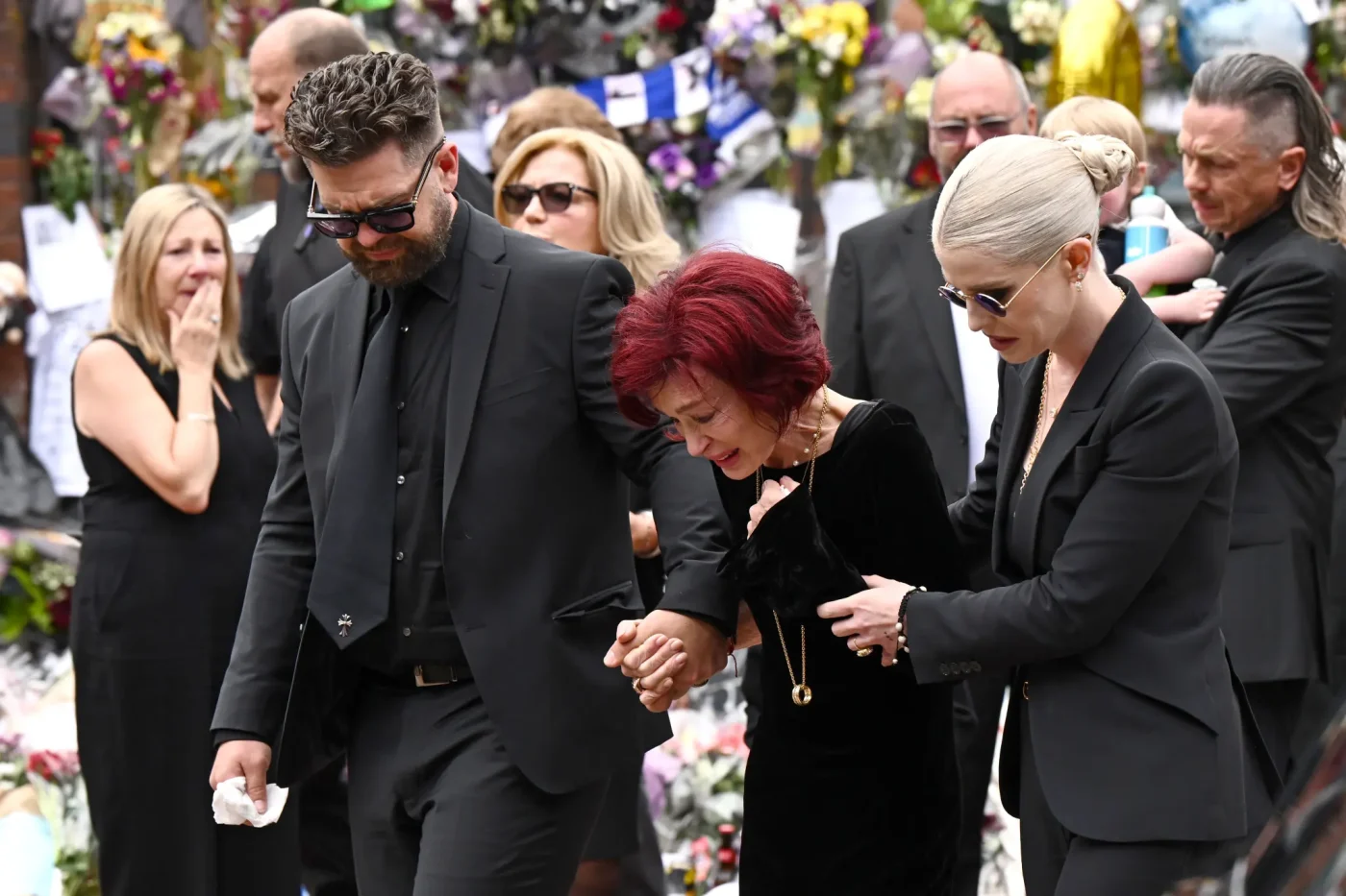 Jack Osbourne, Sharon Osbourne, and Kelly Osbourne arrive to view tributes to Ozzy Osbourne.