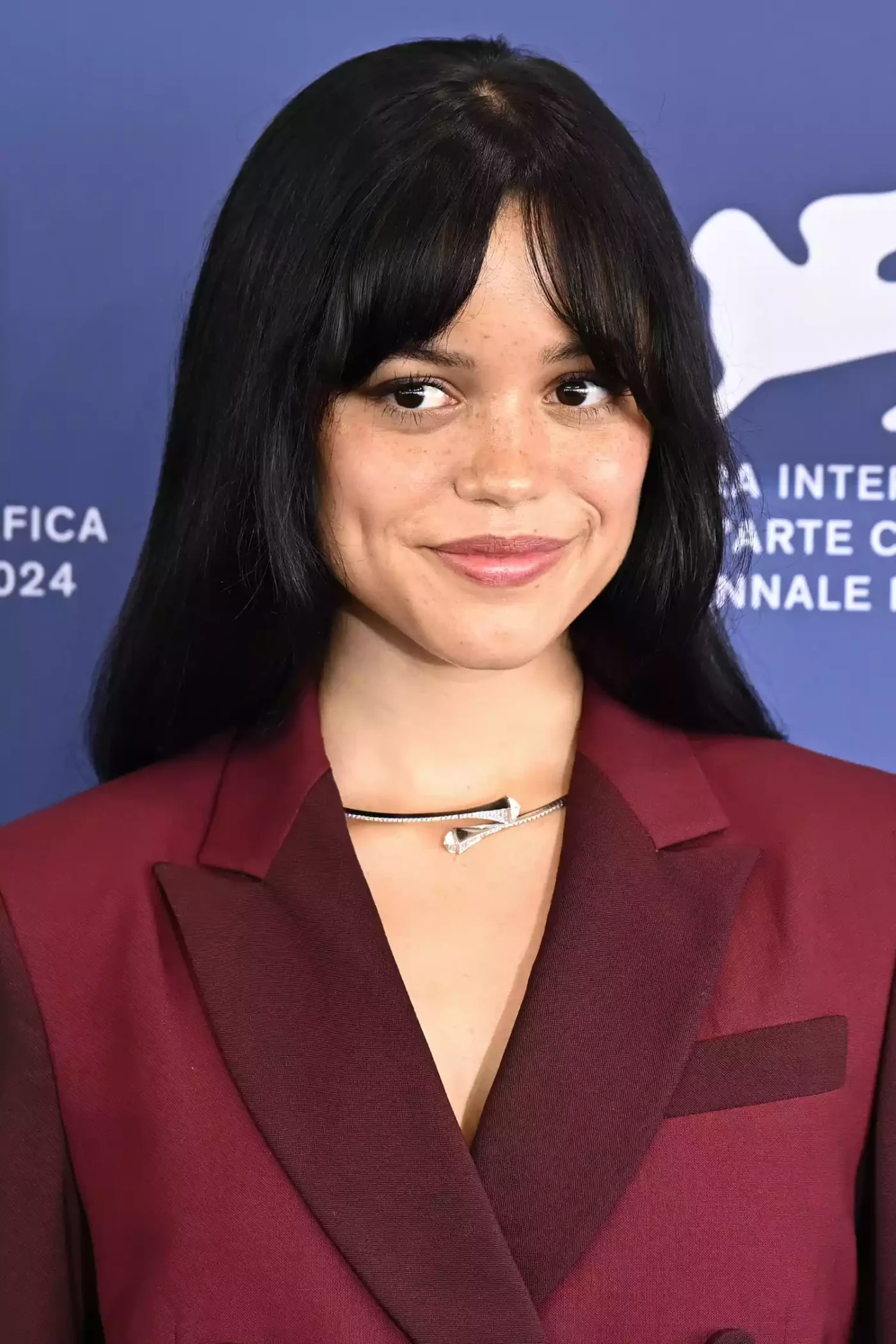 Jenna Ortega with curtain bangs, a 1970s hairstyle