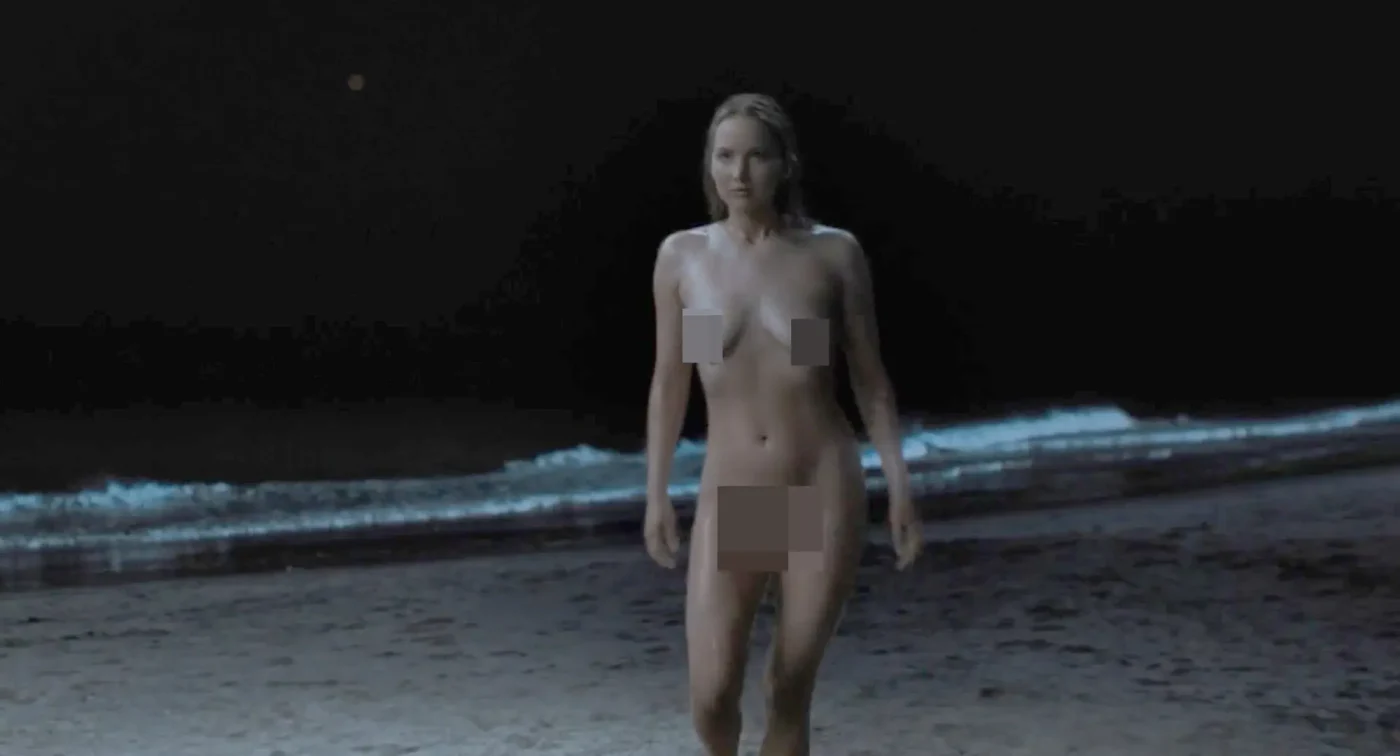 Jennifer Lawrence on a beach at night in No Hard Feelings.