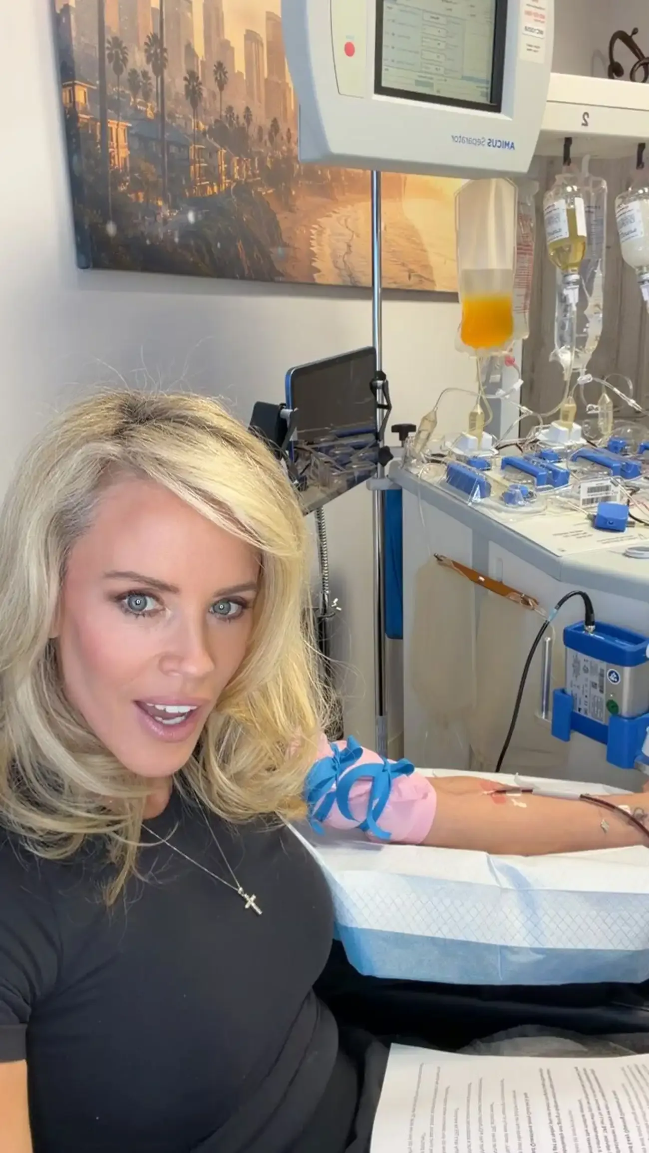 Jenny McCarthy poses during a therapeutic plasma exchange session with Dr. SR Savage, as seen in an Instagram post shared Aug. 18.